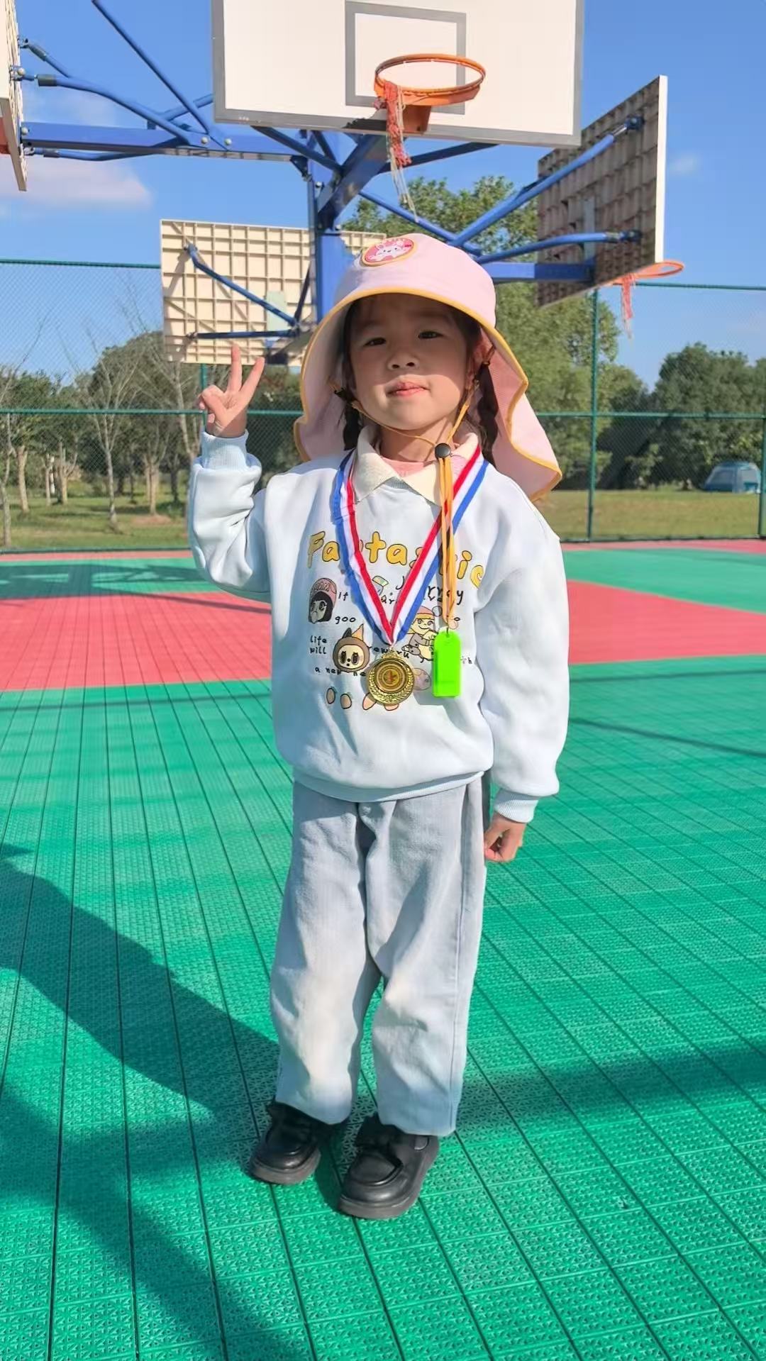 A child who never leaves their medal behind