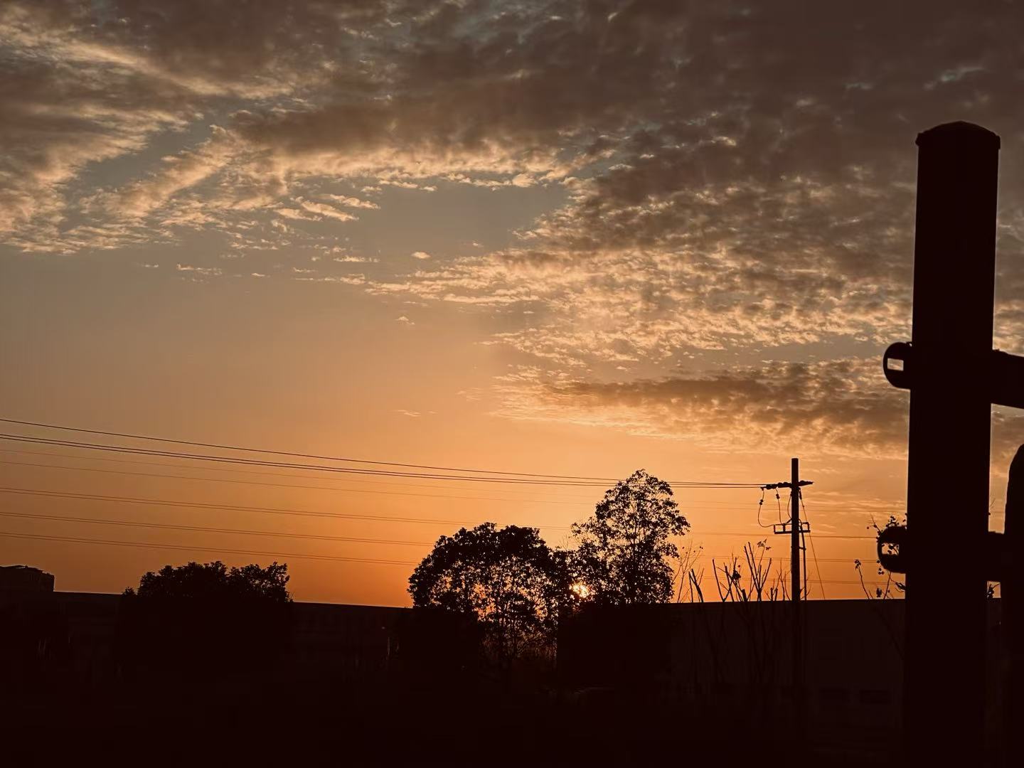 The sunset outside the window